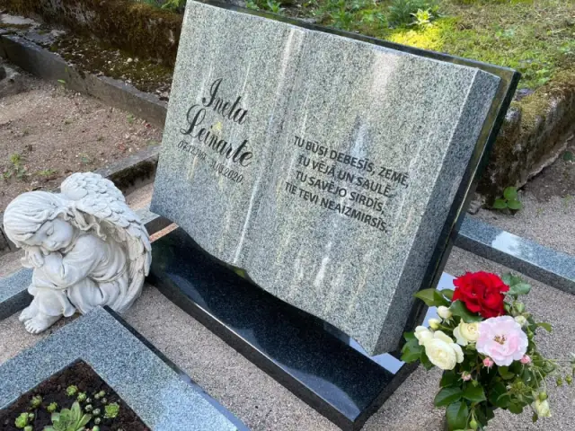 Granite funerary monument in a shape of a book